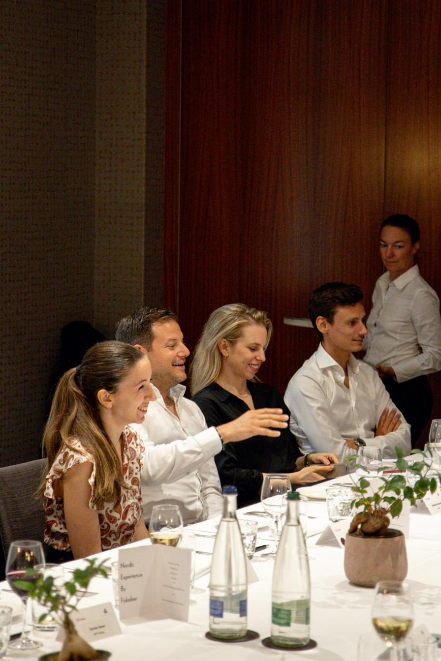 Guests seated at a private dinner table